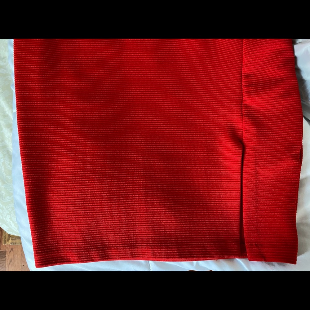 Express red dress in a size XS. Goes down to the knee but has a sexy slit. - Picture 5 of 6